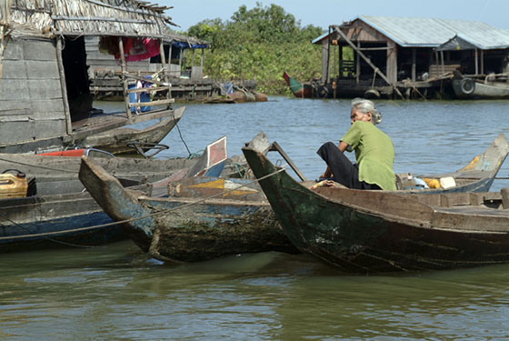 Cambodia-Tonle Sap Lake-Wisdom in a boat