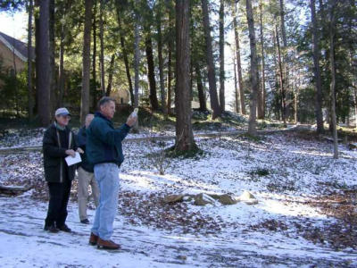 Site of the major garden, north and east of the church. Committee members L-R: David Dethero, Ed Collins, Jim Holmes. [image looking west]