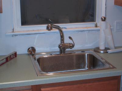 Day 10 - Sink and faucet are installed