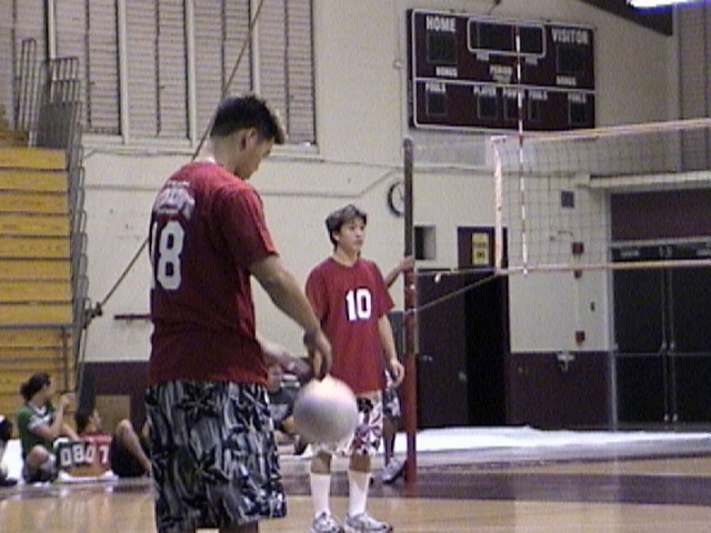 Clint serving and Kyle waiting to move to setting position
