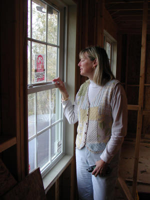 Heather locks the newly installed window