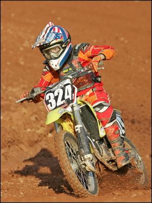 07-Local rider Jake Wilson eyes the second table top at Breman Raceway.jpg