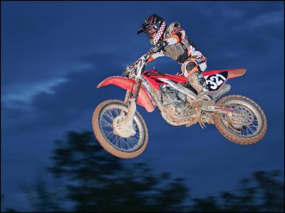 16-Local unknown rider launches off the 15 footer as the sun sets in Bremen GA.jpg