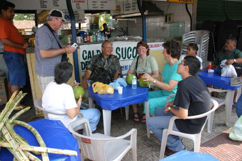 Enjoying sugar cane juice & coconut water