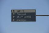 Funny sign (Which country do you want to go to from Brazil? Argentina or Paraguay)