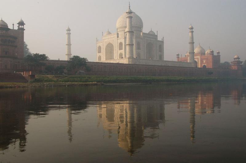 Morning reflection of the Taj Mahal in the Yamuna RIver