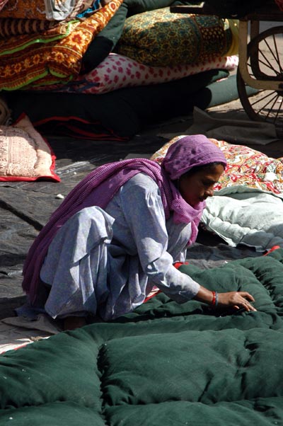Woman working on a quilt