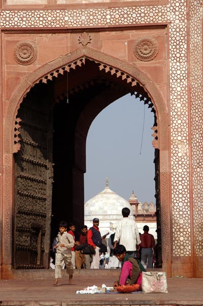 The gate is a gauntlet of beggars and hawkers