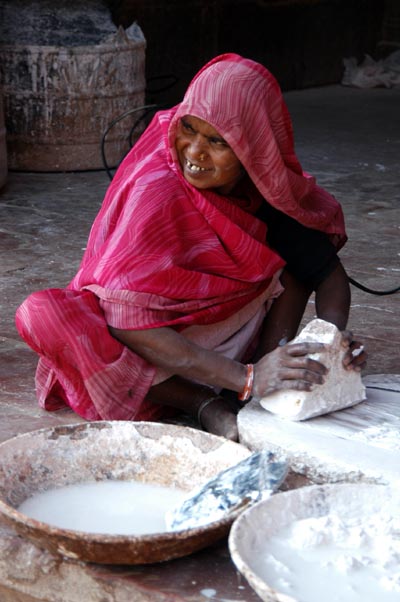 Woman preparing a mixture for repairs