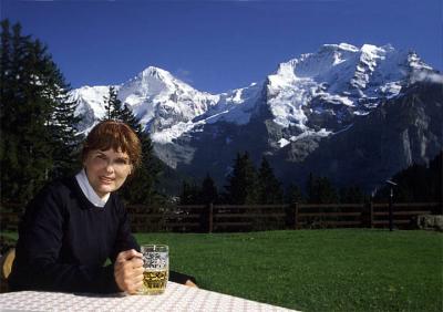 Carolyn at Murren with  Eiger  and  Jungfrau Mountains in the background.jpg