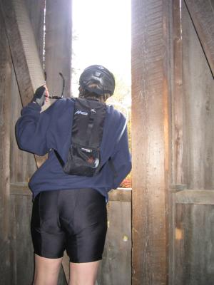 Inside a covered bridge, looking out