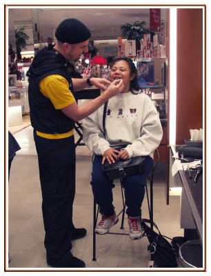 ...where a make-up artist is dressed in team colors.