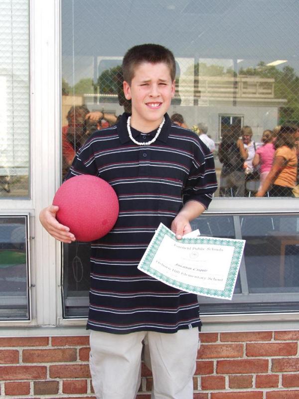 Jon with diploma .jpg