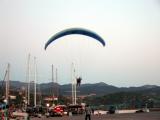 91 Paragliders land