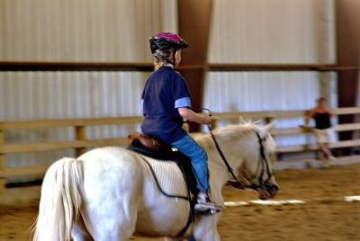 Emily taking horse riding lessons
