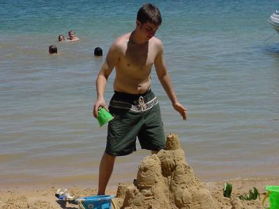 10Tom makes a sand castle.JPG