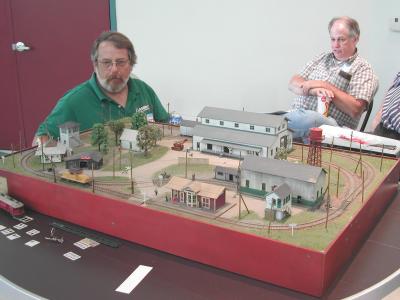 John Hitzeman of AMB shows off electric ops on his little portable layout.  Of course, AMB models are prominently featured!