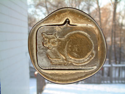 January 2002: Glass window ornament, taken from from kitchen looking out to back.