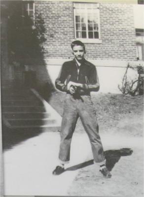 Elvis as a young teen in front of 185 Winchester St.