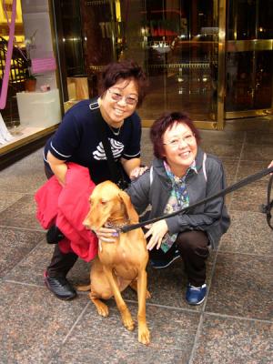 Doggie and 2 sisters outside Trump Building...