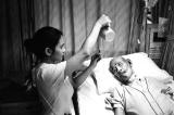 Nurse Tube Feeding Patient