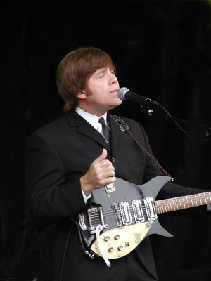 Mark Benson (John) plays an authentically styled 1958 Rickenbacker Hamburg 325 Capri guitar which he handmade.