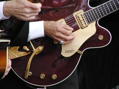 Jimmy Pou plays a reissue 1963 Gretsch 6122 Country Gentleman.