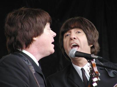 Gary (Paul) and Jimmy (George) sing.