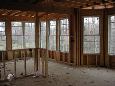 From the kitchen looking through to the sunroom - windows everywhere