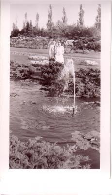 Groom and Bride by fountain