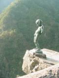 Peeing boy statue