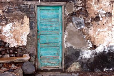 Green door at seaside