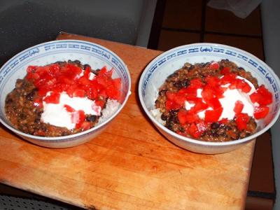 black bean chili with tomatoes and sour cream