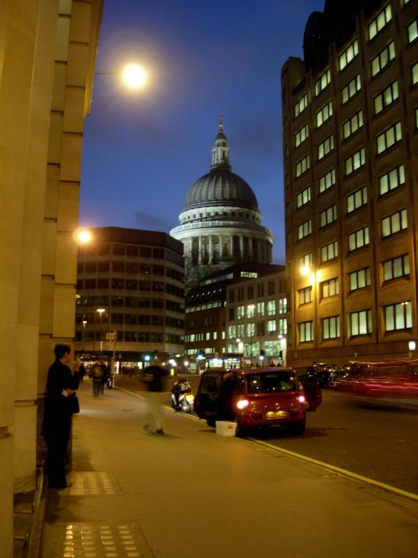 The famous dome of St. Pauls, peeking through modern buildings.