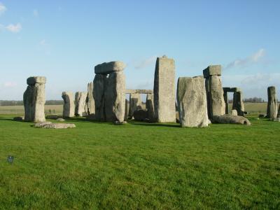 The tall stone in the centre has a very clear bump that would have fit into a socket on the horizontal capstone.