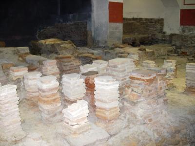 Remnants of the hypocaust system. The pillars acted as floor supports, and hot air circulated beneath the floor.