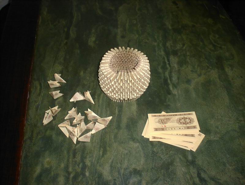 Chinese using worthless money for making fun