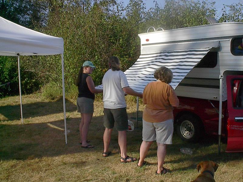 182 Judy helps Scott and Jeanie break camp.