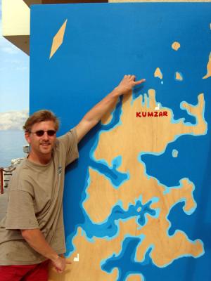 Florian pointing to our starting point, Khasab, and Abu Sir Island, near Kuzmar
