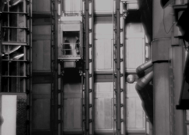 two men in a lift
