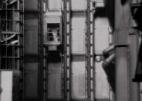 two men in a lift