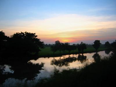 sunrise - northern thailand from the train.jpg