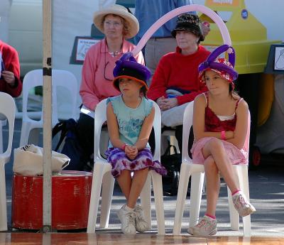 girls joined by balloon