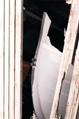 boat resting in a boathouse