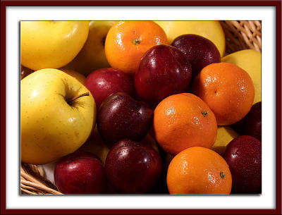 Golden apples, plums and clementines..
