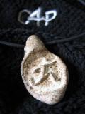 Amulet from aka