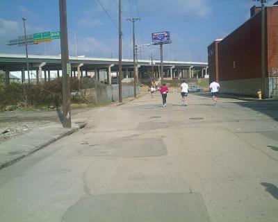 Through an industrial area just after the half-marathon point