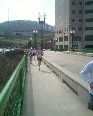 Runners following me across the bridge