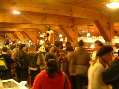 Many people in cheese factory shop