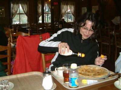 Nancy tasting an original Dutch pancake